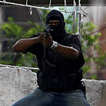 Un 'narco' armado. | AFP