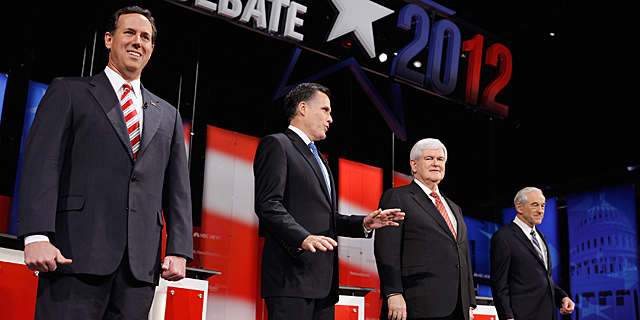 Rick Santorum, Mitt Romney, Newt Gingrich y Ron Paul, antes del debate. | AFP