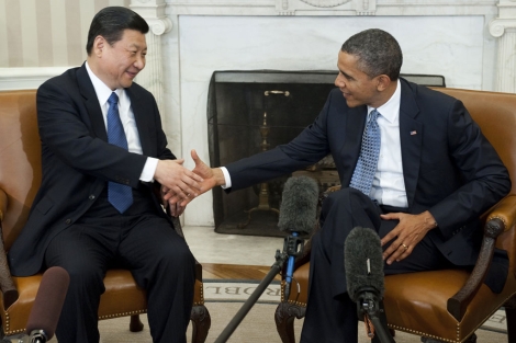 El vicepresidente chino, Xi Jinping, y el presidente Barack Obama.| Afp