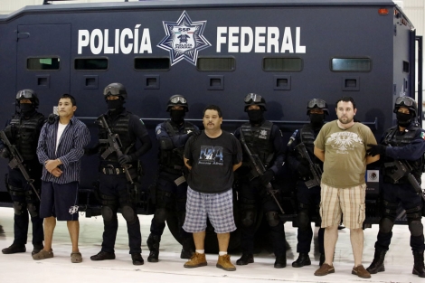Detenidos acusados de estar relacionados con la ejecución de José Eduardo Moreira. | Reuters