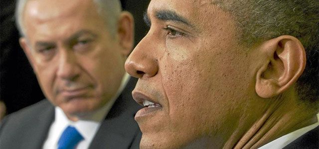 Netanyahu, en segundo plano, junto a Obama, este año en la Casa Blanca.| Afp
