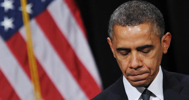 Obama, emocionado, durante la ceremonia de homenaje a las vctimas del tiroteo en Newtown. | Afp