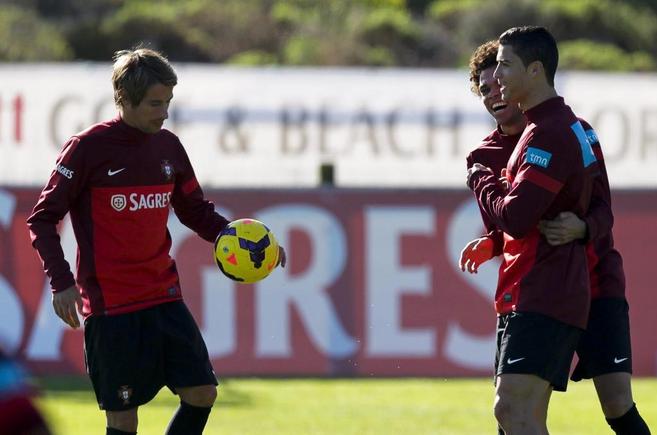 Coentra,  Pepe y Cristiano, en el entrenamiento de Portugal.
