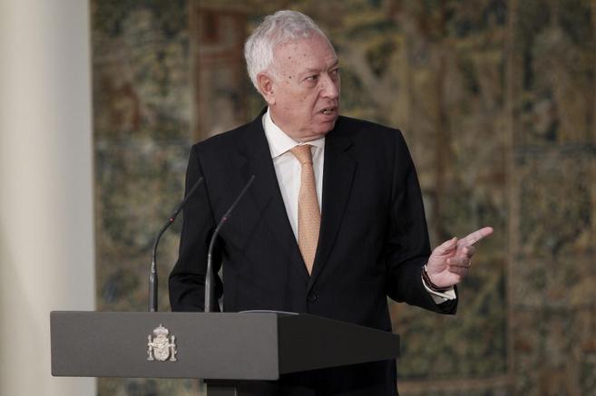 Jos Manuel Garca Margallo habla detrs de un podio.
