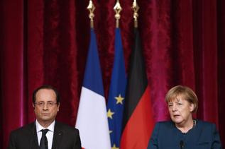 Hollande y Merkel, en el Elseo.