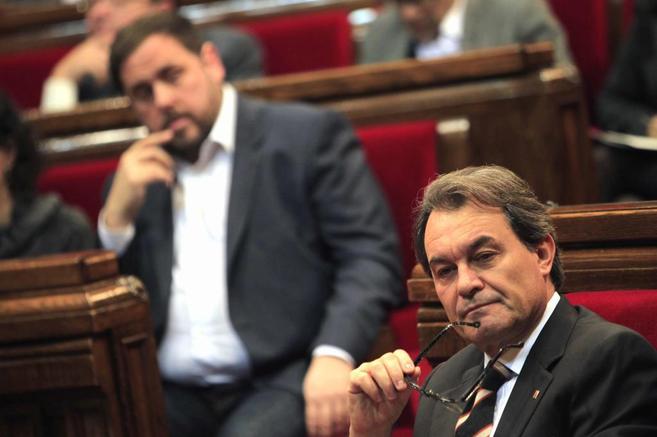 El presidente de la Generalitat y el líder de ERC, Oriol Junqueras,...