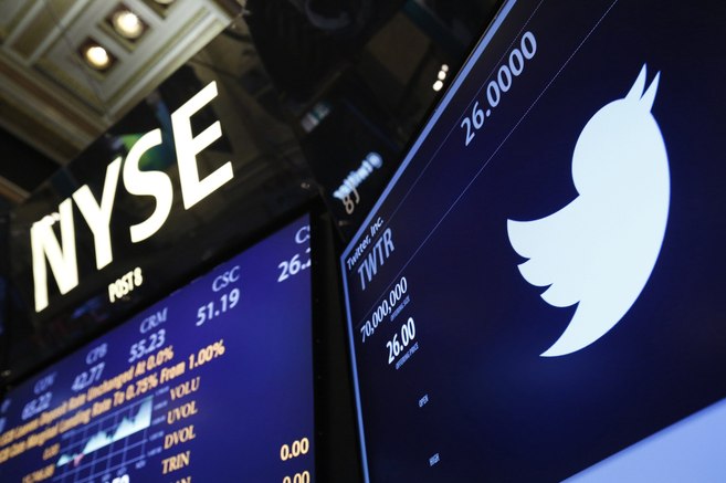 The Twitter logo is seen on the floor of the New York Stock Exchange...