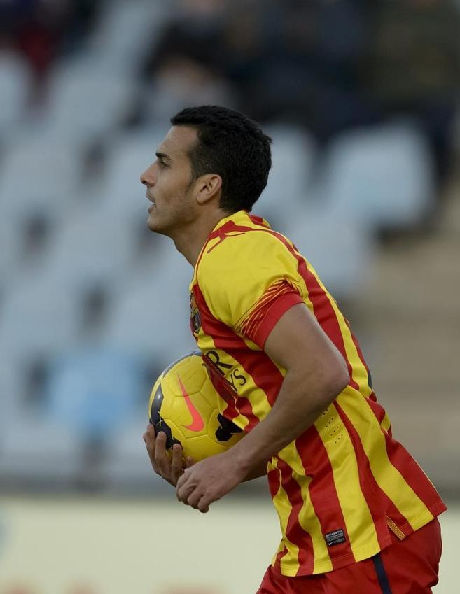 Pedro celebra uno de sus tres goles ante el Getafe.