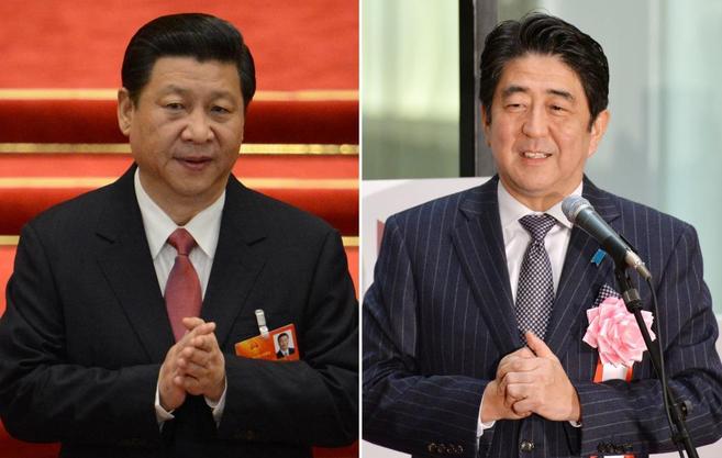 El presidente chino, Xi Jinping, y el primer minsitro japons, Shinzo...