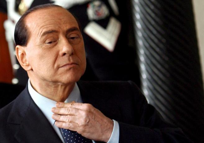 El lder italiano, Silvio Berlusconi, a su salida del palacio...