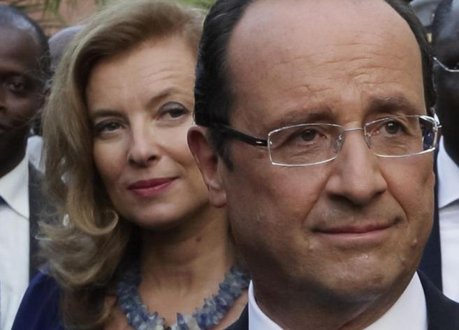 French President Francois Hollande and his companion Valerie...