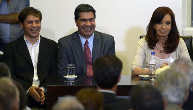 Cristina Fernandez de Kirchner junto a Axel Kicillof (izda) y a Jorge...