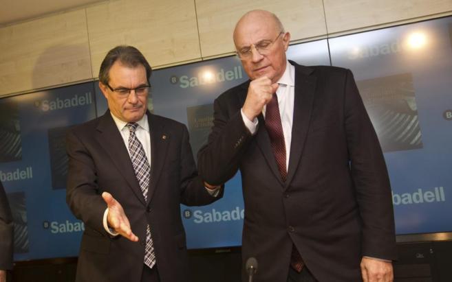Artur Mas y Josep Oliu, en la presentación del libro 'Capitanes de...