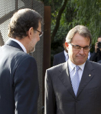 El presidente del Gobierno, Mariano Rajoy, y el de la Generalitat...