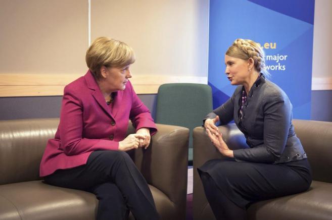 Timoshenko y Merkel, en el Congreso del Partido Popular Europeo...
