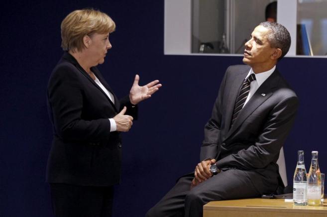 Merkel y Obama charlan durante una reunin del G-20.