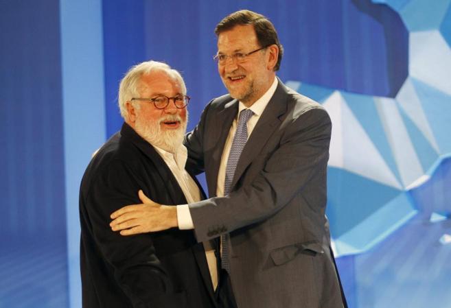 Mariano Rajoy, con Miguel Arias Caete, en Mlaga.
