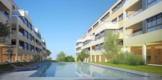 Imagen de una urbanización con piscina.