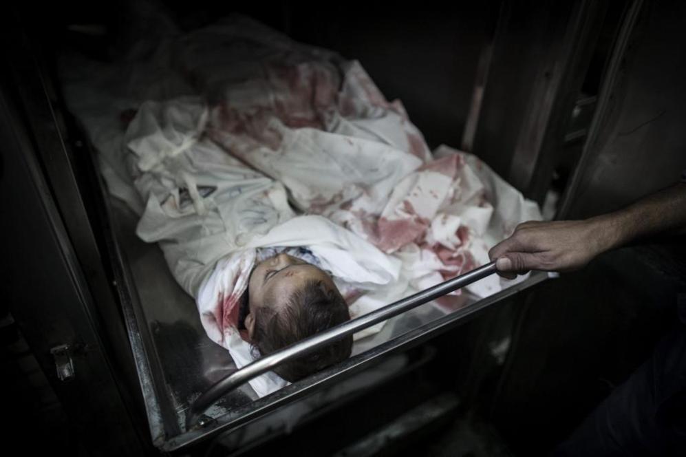 Imagen de un ino asesinado durante un nuevo bombardeo israel sobre...