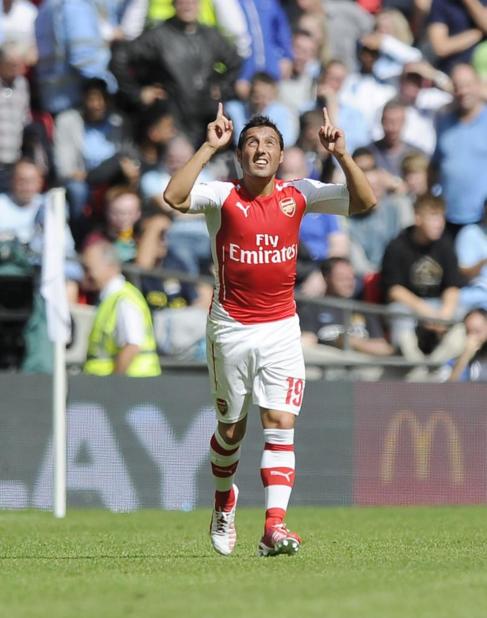 Santi Cazorla celebra el primer gol del Arsenal.