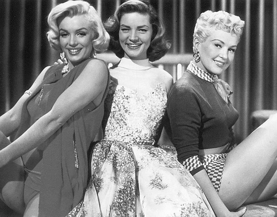 Marilyn Monroe, Lauren Bacall y Betty Grable en una escena de 'Cmo...