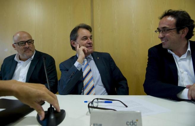 El president Artur Mas junto a sus compaeros Corominas y Rull.