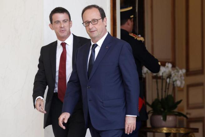 Hollande y Valls, saliendo del Elseo. EFE