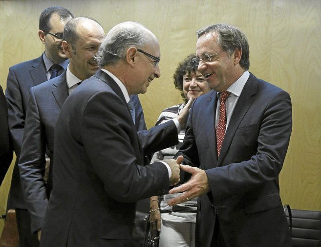 El ministro Montoro y el conseller Moragues.