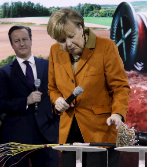 La canciller alemana, Angela Merkel, examina fibra y cables...