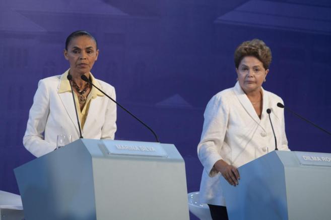 Marina Silva (izq.) y Dilma Rousseff, durante un debate electoral.