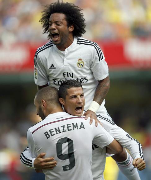 Cristiano, Marcelo y Benzema celebran el segundo gol en El Madrigal