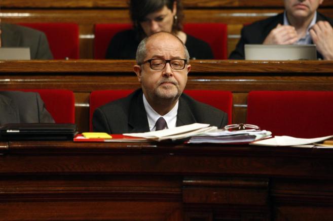 El conseller Felip Puig en un pleno del Parlamento.