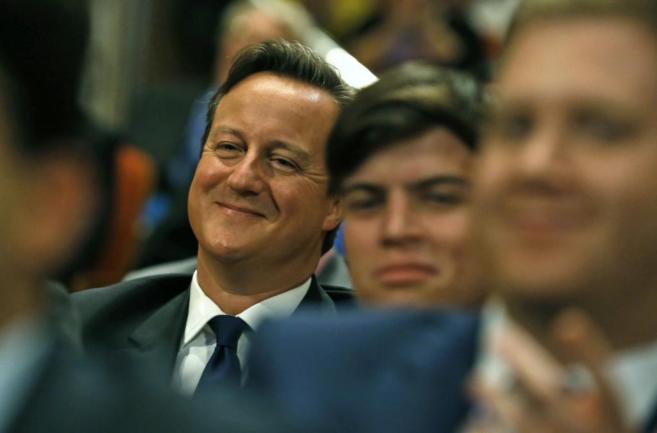 El 'premier' David Cameron sonre durante la Conferencia...