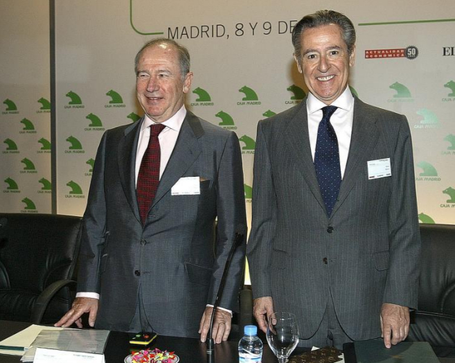 Rodrigo Rato y Miguel Blesa, en un encuentro financiero en 1998.