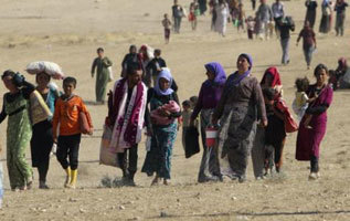 Mujeres yazides huyen del IS en el norte de Irak.