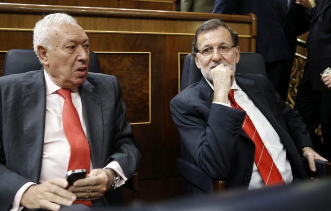 Mariano Rajoy junto al ministro de Exteriores, Garca Margallo, hoy...
