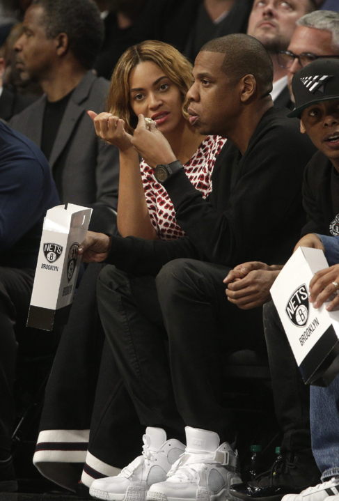 Beyonce Knowles y su marido, durante el citado partido.