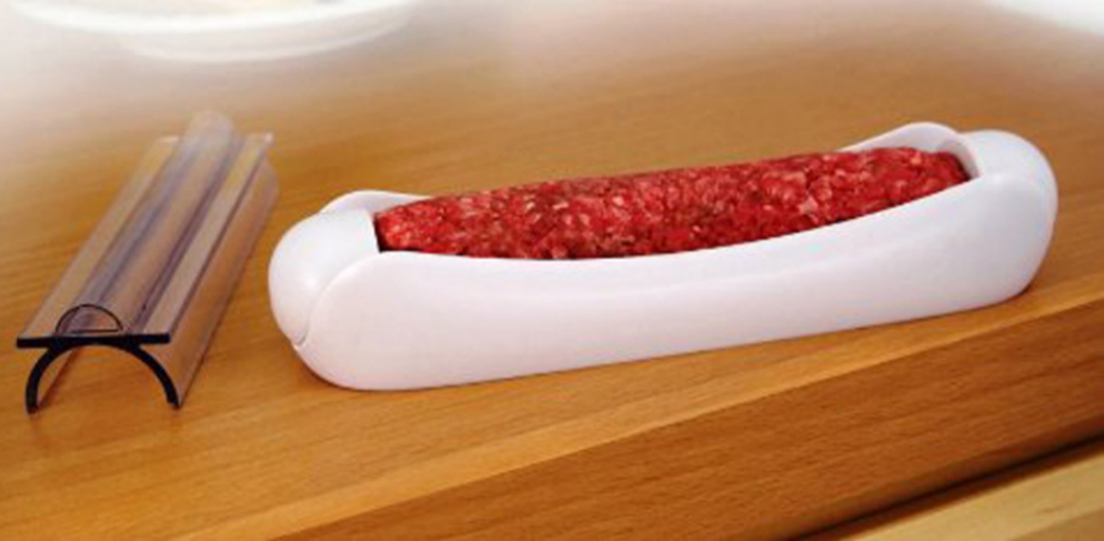 Este artilugio para hacer hamburguesas con forma de perrito caliente.