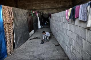 Un nio kurdosirio en un campo de refugiados.