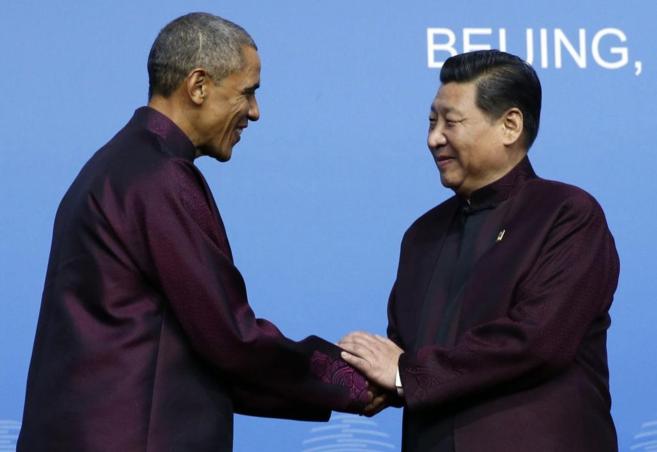El presidente de EEUU, Barack Obama, saluda a su homlogo chino, Xi...