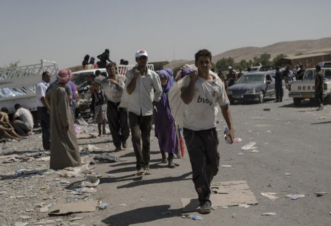 Refugiados en Erbil Fyash Kabour, el paso fronterizo entre Siria e...
