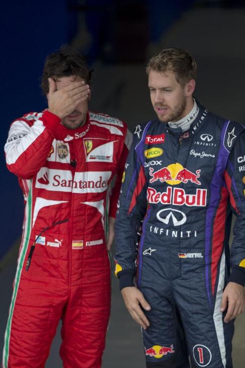 Alonso y Vettel, durante un gran premio del Mundial.