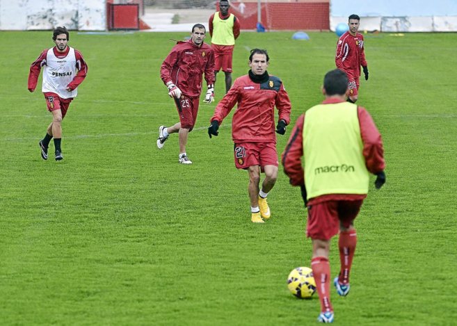 Varios jugadores del Mallorca durante la sesin de entrenamiento de...