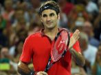Rodger Federer of Switzerland celebrates his victory over James...