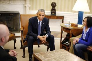 Obama, con sus invitados antes del gran debate.