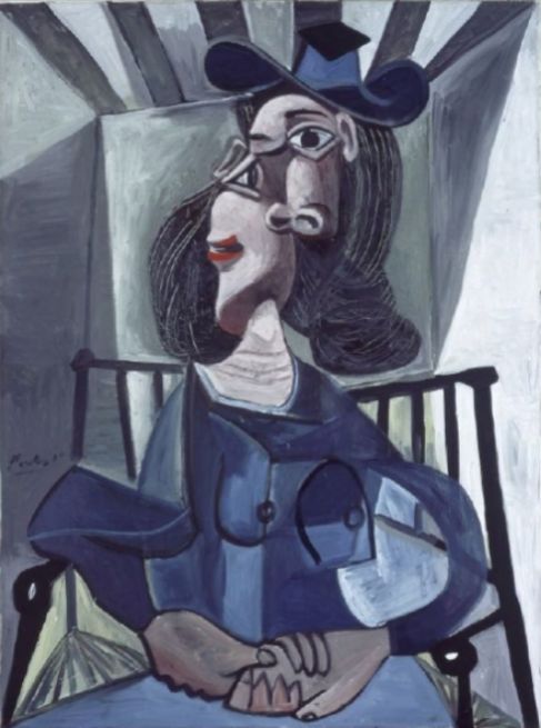 'Femme au chapeau assise dans un fauteuil' de Picasso.