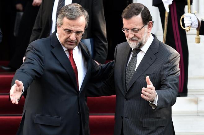 Rajoy con el ex primer ministro heleno, Antoni Samaras.