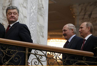 Poroshenko, Lukashenko y Putin, en Minsk.