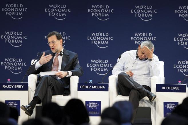 Rajoy (izda.) y Prez Molina en 2012 en el Foro Econmico Mundial,...