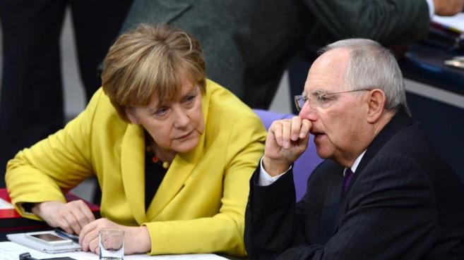 La canciler alemana y su ministro Finanzas.